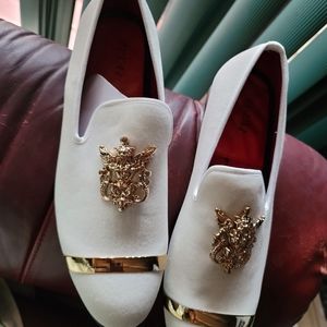 Off white crushed velvet material with gold trim